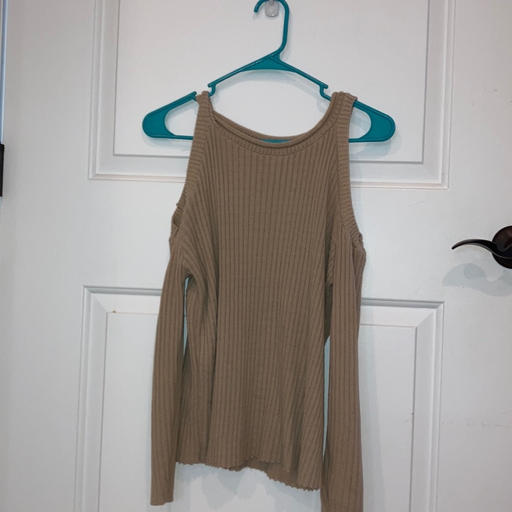 a shoulder less sweater